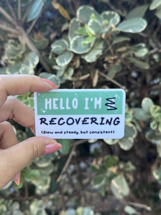 Title: Waterproof Die-Cut Vinyl Sticker — Mock Name Tag: Hello, I'm Recovering